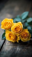 Vibrant yellow roses with lush green foliage arranged on rustic wooden surface, perfect for floral designs, greeting cards, and wedding projects.