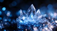 Magical blue crystal cluster with glowing light effects and bokeh background, macro photography of mineral formation against dark backdrop with sparkling highlights.