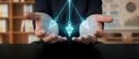 Businessman holding glowing geometric hologram between hands, representing digital innovation, technology solutions, and future business concepts for corporate presentations.