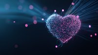 Glowing heart shape formed by luminous particles and light rays in pink and blue colors against dark background with bokeh effect creates romantic atmosphere.