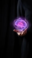 Businessman holding glowing purple brain hologram with energy waves representing artificial intelligence, innovation and mental power concepts.