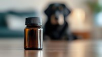 Amber glass medicine bottle with black cap on wooden surface in blurred laboratory or pharmacy background for pharmaceutical and healthcare concepts.