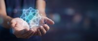 Business professional holding glowing network connection hologram in cupped hands representing digital transformation and connectivity solutions.