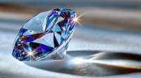 Brilliant diamond with blue and purple reflections on light surface, sparkling with rainbow colors in soft lighting.