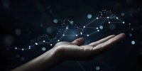 Open palm against dark background, representing technology innovation and future business growth concepts.