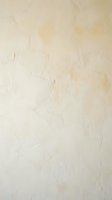 Cream beige marble stone texture with natural veining and subtle cracks for luxury interior design backgrounds and architectural surface applications.