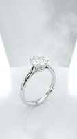 Elegant diamond solitaire engagement ring with brilliant cut stone on white platinum band, luxury jewelry for wedding proposal and romantic occasions.