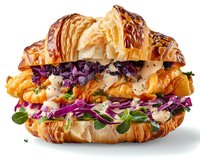 Fresh croissant sandwich filled with purple cabbage slaw, microgreens, and creamy sauce on white background, appetizing close up view for menu or advertising.