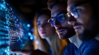 Young diverse professionals analyzing glowing data visualization and code on computer screen in modern tech office environment for software development.