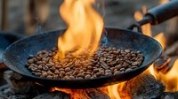 Roasting coffee beans in traditional pan over open flame with bright orange fire, dramatic lighting captures artisanal coffee making process in dark atmosphere.