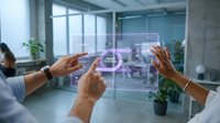Hands interacting with holographic augmented reality interface displaying digital building blueprint and architectural design in modern office environment with windows.