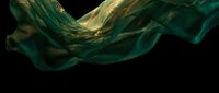 Flowing emerald green and gold silk fabric with elegant waves and luxurious texture against black background for premium design projects and artistic compositions.
