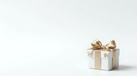 White gift box with gold ribbon bow isolated on white background, ready for holiday, birthday, and celebration design projects.