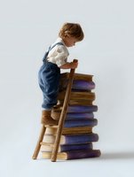 Young boy in denim overalls climbing wooden ladder leaning against stack of large vintage books on white background, symbolizing education and childhood curiosity.