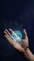Glowing mystical eye symbol floating above an open male hand against a dark blue smoky background, evoking magic, vision, and spiritual power.