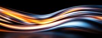 Dynamic glowing waves with orange and blue light streaks flowing smoothly against dark background, creating modern abstract design pattern for technology concepts.