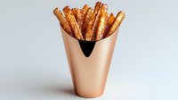Golden crispy french fries in copper metallic holder on light background, isolated food photography for restaurant menu and fast food advertising.
