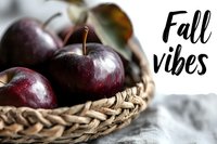 Fresh red apples in wicker basket with fall vibes text for autumn harvest marketing, seasonal produce advertising and healthy eating campaigns.