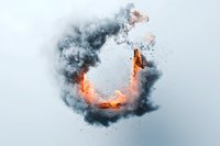 Dramatic circular flame and smoke explosion against light background creates dynamic contrast between orange fire and dark gray clouds, suitable for design projects.