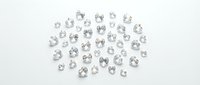 Collection of sparkling clear diamonds scattered on white background, isolated gemstones for luxury jewelry design and precious stone concepts.