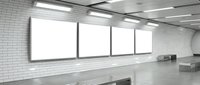 Modern subway station interior with blank illuminated advertising panels on white tile wall, empty platform space for commercial messaging and public transportation design concepts.