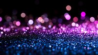 Magical pink and blue glitter bokeh background with sparkling defocused lights creating dreamy atmosphere. Abstract festive backdrop for celebrations and events.