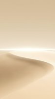 Smooth sand dune with soft shadows and warm beige tones, creating an abstract desert landscape. Suitable for backgrounds, minimalist design, and travel concepts.
