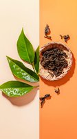 Fresh green tea leaves and dried loose black tea in ceramic bowl on dual colored background, showing tea transformation process from fresh to processed state.