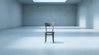 Single wooden chair positioned in empty minimalist room with concrete walls and bright overhead lighting, suitable for conceptual design and editorial use.