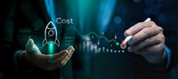 Business professional analyzing cost reduction strategy with rocket icon and financial charts on digital interface for corporate growth planning.