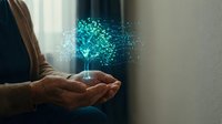 Businessman hands holding glowing digital brain with particle effects representing artificial intelligence and innovation in modern technology.