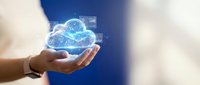 Hand holding holographic cloud computing icon with digital data streams and network connections for technology presentations and business solutions.