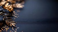 Elegant golden pine cones with sparkling glitter on dark blue background with warm bokeh lights creating festive holiday atmosphere for seasonal decorations.