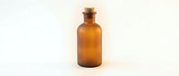 Vintage amber glass apothecary bottle with cork stopper isolated on white background for pharmaceutical and medical design projects.