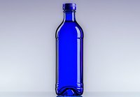 Cobalt blue glass bottle with screw cap on light background, minimalist composition for beverage packaging and product photography.