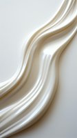 Smooth flowing white cream or milk abstract background with silky wavy texture and soft curves creates elegant luxury design element for cosmetic packaging.