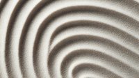 Minimalist zen sand pattern with concentric circles creating meditative ripples and curves in natural beige tones, suitable for wellness and spa designs.