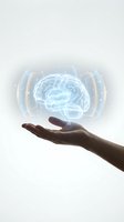 Hand holding holographic brain with digital waves representing artificial intelligence, neuroscience research, mental health technology and cognitive science concepts.