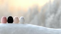 Cute minimalist kawaii characters lined up on snowy surface against soft blurred winter background. Decorative figurines in pastel and black colors.
