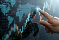 Businessman finger pointing at financial trading chart with world map background showing global market analysis and investment data visualization.
