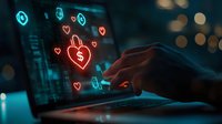 Online dating scam concept with hand typing on laptop at night, glowing heart and dollar icons floating above keyboard, dark cybercrime background.
