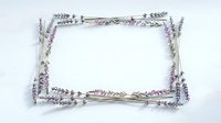 Lavender sprigs arranged in decorative rectangular frame border on white background for wedding invitations, botanical designs and floral projects.