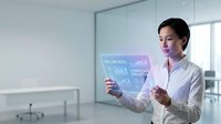 Asian businesswoman analyzing holographic data visualization in modern office environment for corporate technology presentations.