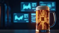 Golden beer mug with foam on dark background with blurred financial charts and trading screens for business celebration and success concept.