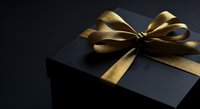 Black gift box with gold ribbon bow on dark background, suitable for luxury product packaging, holiday promotions, and celebration designs.