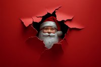 African American Santa Claus peeks through torn red paper hole, wearing traditional hat and white beard, creating playful holiday breakthrough effect.