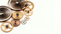 Vintage clockwork mechanism with brass gears and metal springs isolated on white background for steampunk design projects and mechanical concepts.