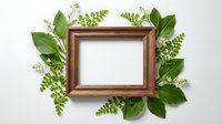 Wooden frame surrounded by fresh green leaves and ferns on white background, suitable for nature-themed designs, botanical presentations, and eco-friendly branding projects.