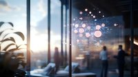 Futuristic business interface with glowing dots and data visualization overlaid on blurred office interior at sunset, showing modern workplace technology.