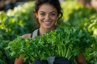 Young woman with dark hair and olive complexion, wearing casual clothing, holding fresh leafy greens in a garden setting. Suitable for organic farming, agriculture, and healthy lifestyle content.